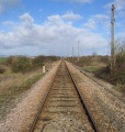 This is the view across the bridge towards Severn Beach station. © Mike P