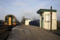 A view along the platform with 159016 awaiting passengers. © Andrew Ross
