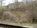 Just past the bridge are the remains of an old staircase that lead to the platforms.
