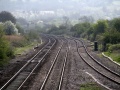 Looking south from the station footbridge. The chimneys of Cattybrook Brickworks can be seen in the distance.