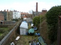 The view from the bridge looking towards Avon Crescent. The railway that once went to Canons Marsh has become a boatyard, and beyond, housing.