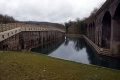 The newly-built diversionary route of the canal skirts the River Frome and cuts through land previously used as a landfill site.