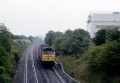 47095 descends towards Henbury during the mid 90's. The building behind the loco was designed for the Bristol Brabazon. © Geoff Hartland