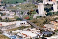 An aerial view of the area showing Barrow Road leading to the large roundabout at Lawrence Hill. Also visible is the Bristol City Council Refuse Transfer Station and the branch to Avon Street.