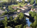 An aerial view of the viaduct which shows the eastern end of Bath Spa station and St James Bridge across the River Avon. September 2003. © John Rawlings