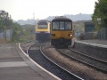 A Class 143 and an HST pass each other. The 143 is heading for Cardiff, the HST for Temple Meads.