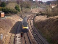 The HST then passes the site of Flax Bourton station which is just visible beyond the bridge carrying Station Road across the railway.