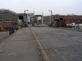 The rails were still embedded in Wapping Road many years after this part of the railway system closed to traffic. This was the view into Bristol city centre, with Princes Street swing bridge spanning the gap in the water. These rails served waterfront warehousing on Bathurst Basin.