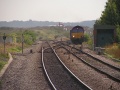66191 snakes her way across the junction with a MGR train for South Wales. 11.10.05