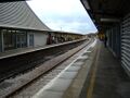 Looking east along the platforms. A healthy crowd is awaiting a London-bound HST.