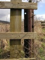 The farmer has incorporated bits of old broad gauge rail into his fence.