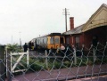 This photo shows a bubble car that has crashed through the buffers c.1977. It also gives a glimpse of the old station building. © Mike P